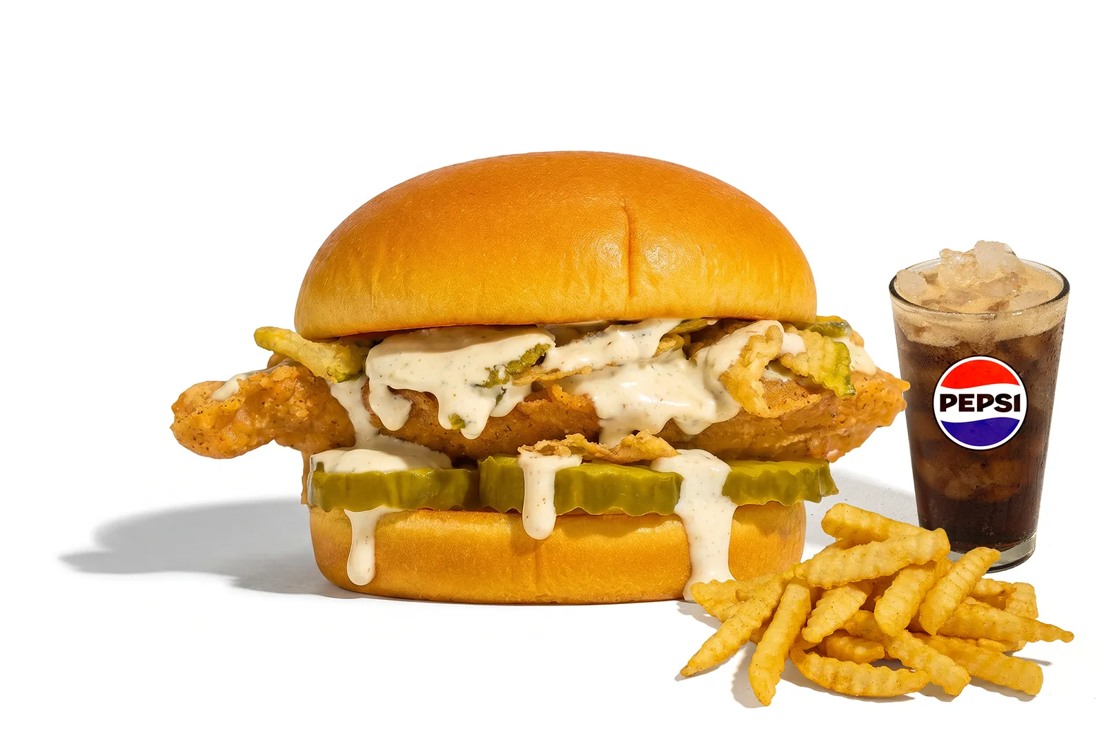 The Chickle meal with fries and a drink on white